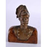 A LATE 19TH CENTURY GRAND TOUR BRONZE BUST OF A MILITARY MALE modelled upon an oak plinth. 12 cm x 8