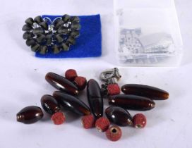 ASSORTED BEADS together with a watch strap etc. Largest 5.5 cm x 4.25 cm. (qty)