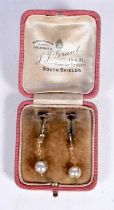 A PAIR OF EDWARDIAN 9CT GOLD AND PEARL EARRINGS. 1.2 grams. 3.5 cm x 1.25 cm.