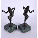 A PAIR OF ART DECO BRONZE FIGURES OF DANCERS modelled upon marble plinths. 21 cm high.