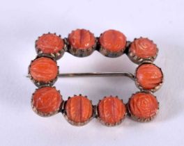 AN ANTIQUE CORAL BROOCH. 4 grams. 2.75 cm x 2.25 cm.