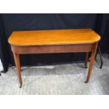 A 19th Century Bow fronted mahogany top side table with castored legs 75 x 124 x 53 cm.