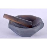AN ART DECO CONTINENTAL AGATE PESTLE AND MORTAR. 11cm wide. (2)