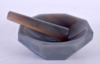 AN ART DECO CONTINENTAL AGATE PESTLE AND MORTAR. 11cm wide. (2)