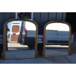 A pair of large giltwood framed mantle top mirrors 127 x 106 cm (2).