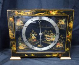 A Chinoiserie mantel clock by Smiths 23 x 27 cm.