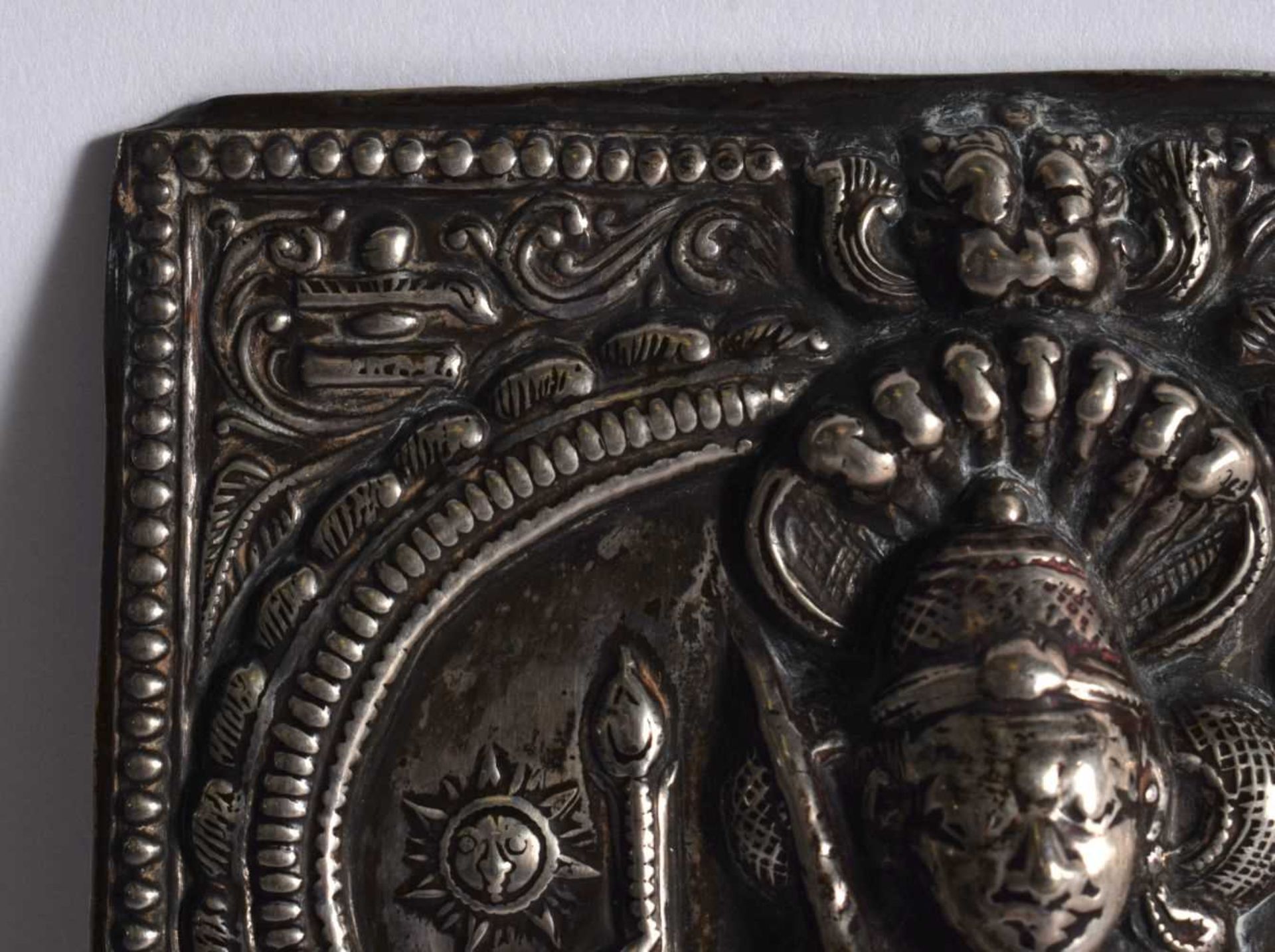 A silver repousse plaque of Shiva, South India, 19th century, of rectangular form, Shiva depicted in - Image 2 of 6