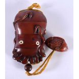 A JAPANESE CARVED WOOD OCTOPUS INRO. 88 grams. 10 cm x 6.25 cm.