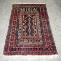 An Afghan Balush rug 148 x 89 cm.