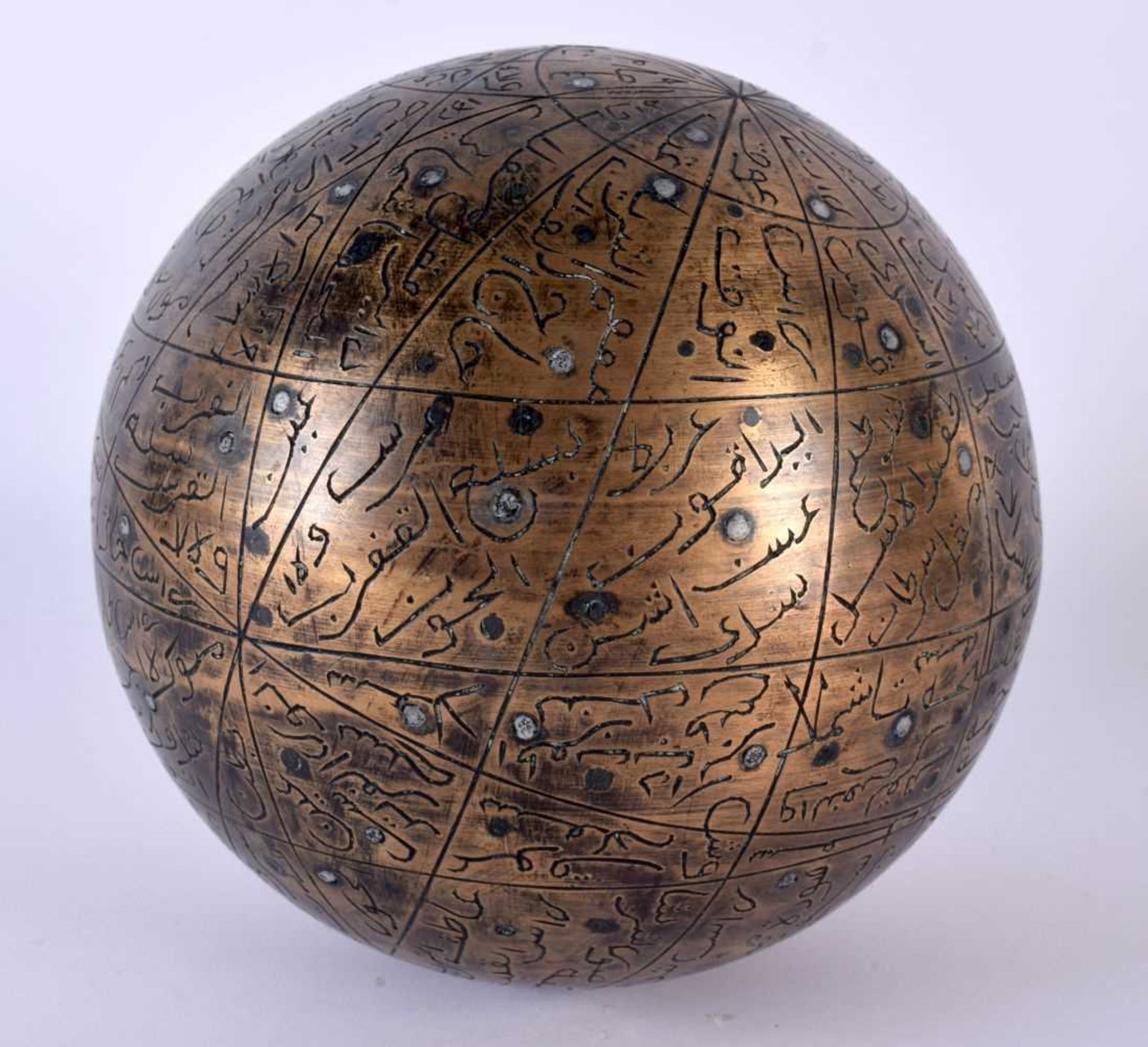 A Large Indo-Persian Brass Celestial Globe, of typical spherical form, constructed of cast heavy