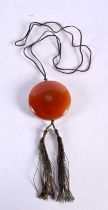 A CHINESE CARVED AGATE NECKLACE. 36.2 grams. 4.25 cm diameter.