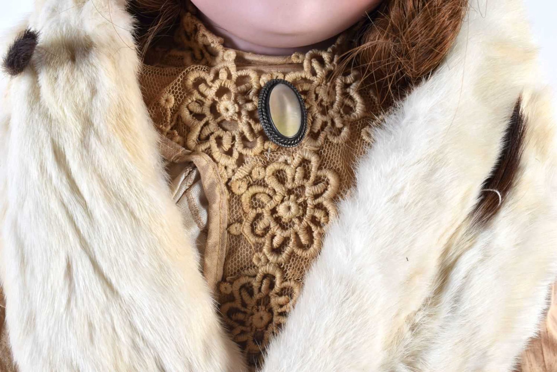 A FINE ARMAND MARSEILLE BISQUE HEADED PORCELAIN DOLL wearing an embroidered neck collar and beige - Image 3 of 7