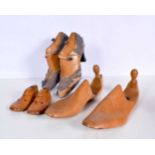 A collection of antique wooden shoe lasts 30cm (6)