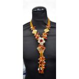 A carved hardstone and multi bead Butterfly necklace 43 cm.