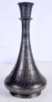 An Islamic Silver inlaid metal vase 24 cm