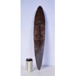 A Carved wood Pacific Island mask 68 cm.