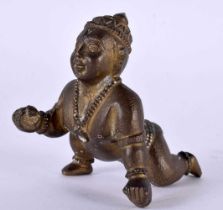 A 19TH CENTURY INDIAN BRONZE FIGURE OF A CRAWLING BUDDHA. 212 grams. 6.5 cm x 5.25 cm.