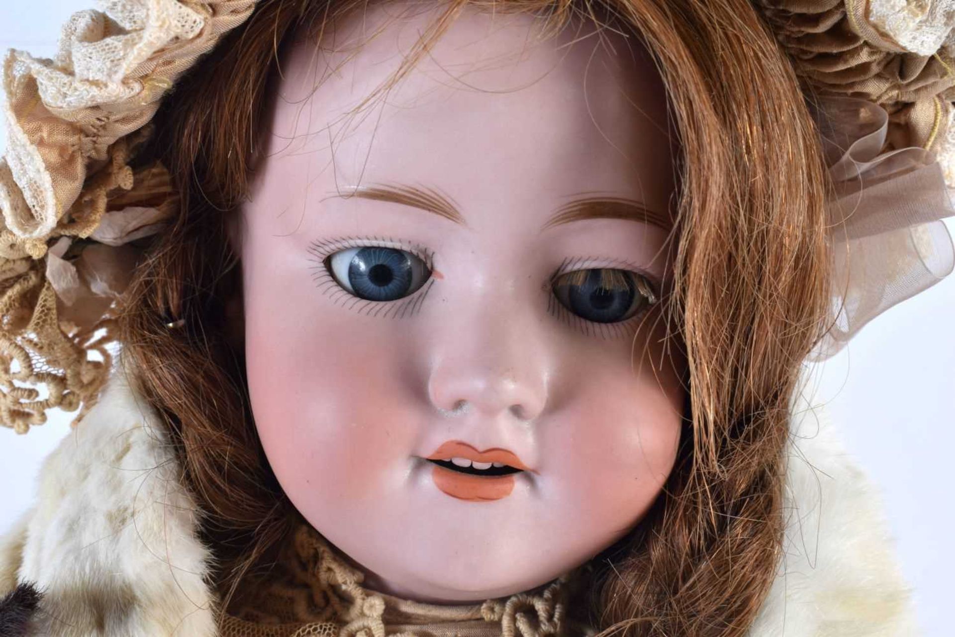A FINE ARMAND MARSEILLE BISQUE HEADED PORCELAIN DOLL wearing an embroidered neck collar and beige - Image 2 of 7