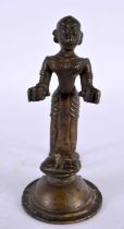 AN UNUSUAL 18TH CENTURY INDIAN BRONZE FIGURE OF A STANDING DEITY modelled holding two open cups.