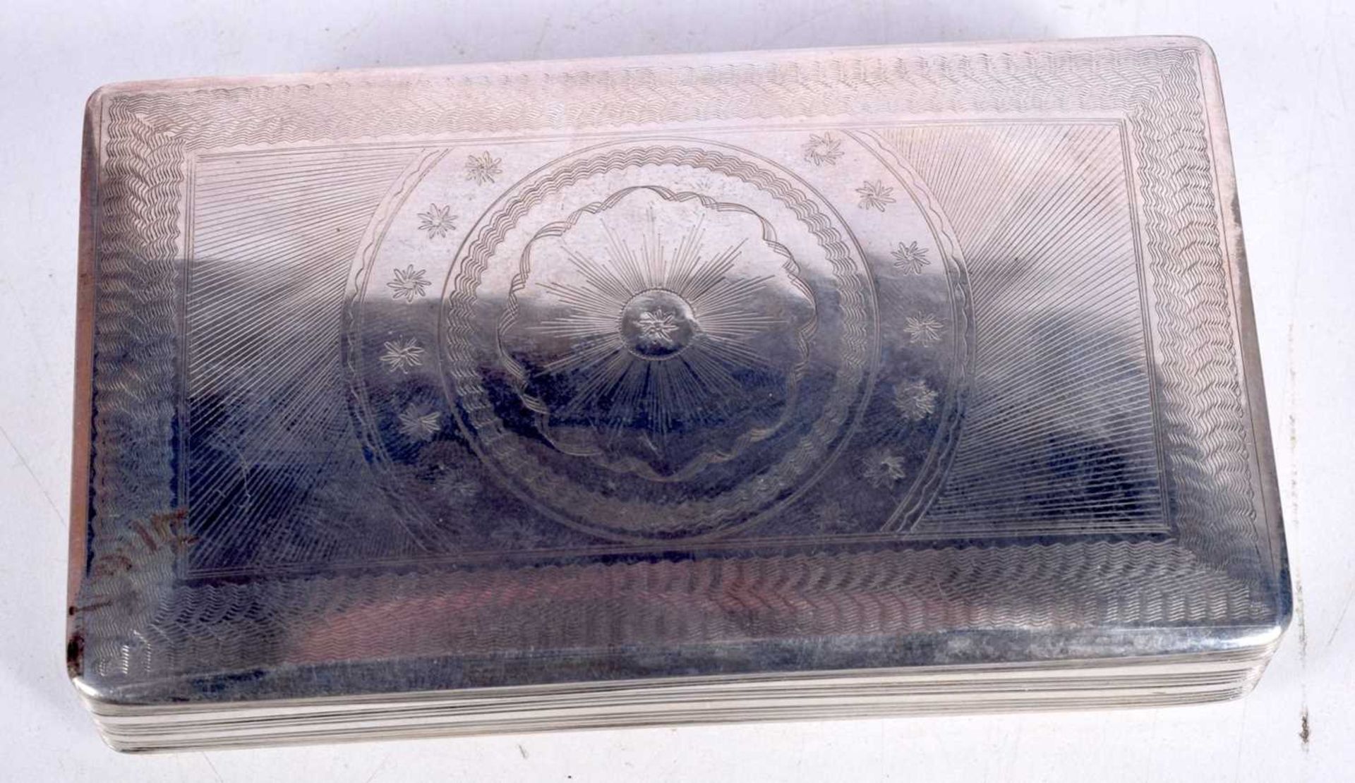 A CONTINENTAL SILVER TOBACCO BOX. Stamped Sterling, 12.4cm x 3.1cm x 7.2 cm, weight 102g