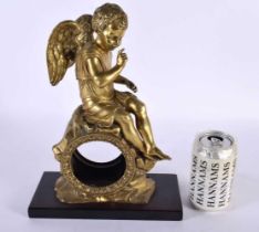 A FINE 19TH CENTURY EUROPEAN ORMOLU CLOCK CASE formed as a winged putti upon a naturalistic outcrop.