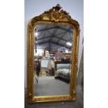 A large Baroque style giltwood mirror 154 x 84 cm.