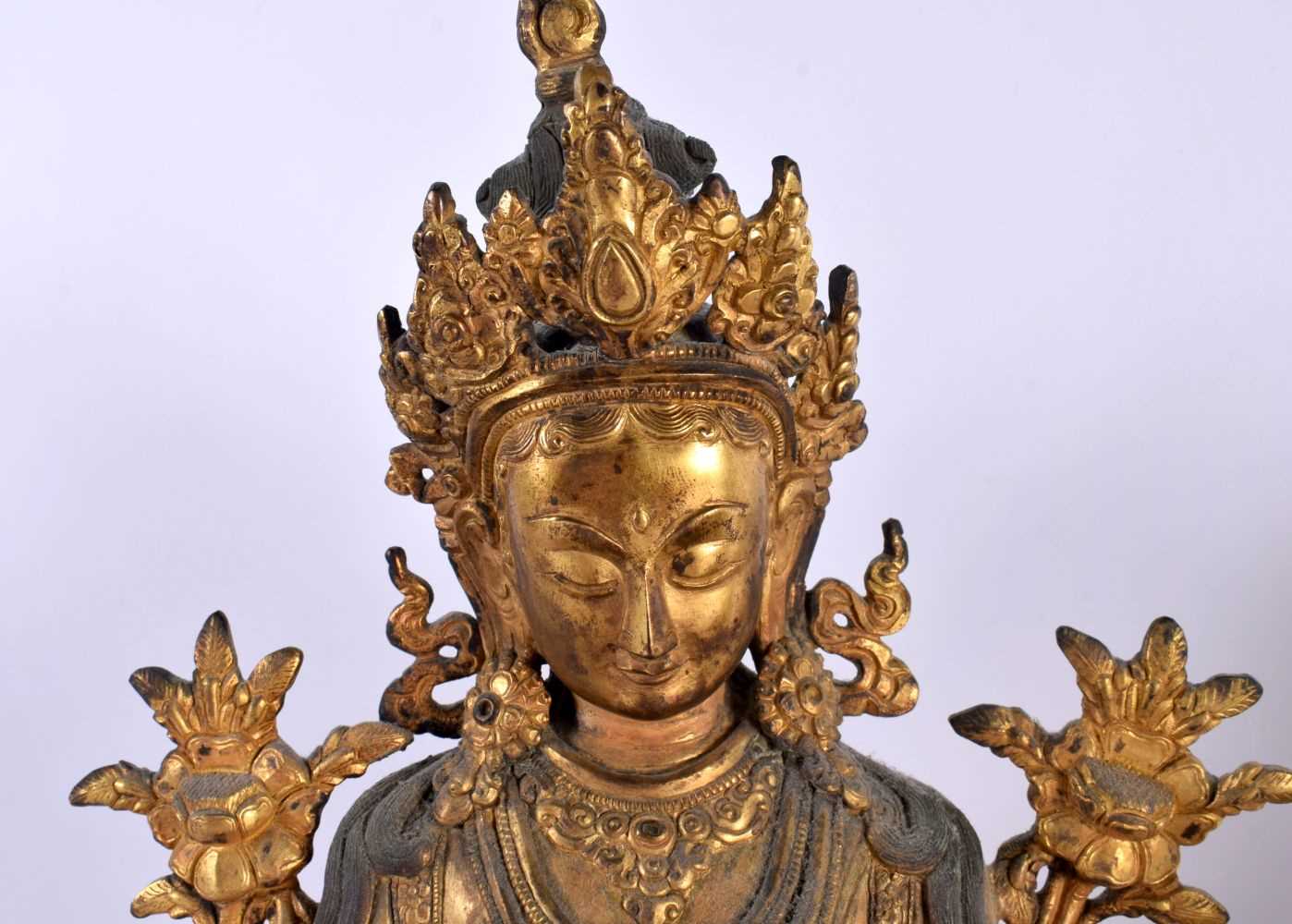 A LARGE PAIR OF 19TH CENTURY CHINESE TIBETAN GILT BRONZE FIGURES OF BUDDHAS Qing, modelled upon - Image 2 of 9