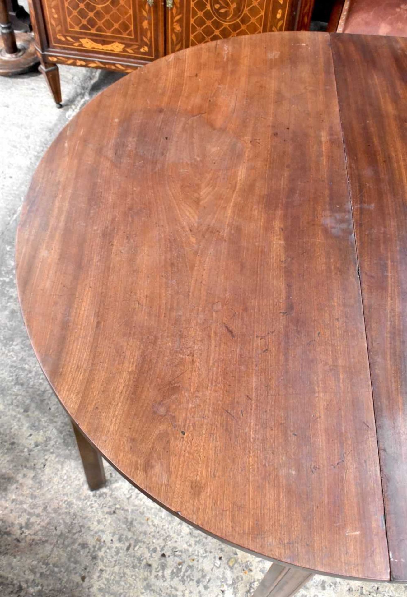 A Mahogany Dining table comprising of a central drop leaf table and two Demilune shaped extensions - Image 2 of 9