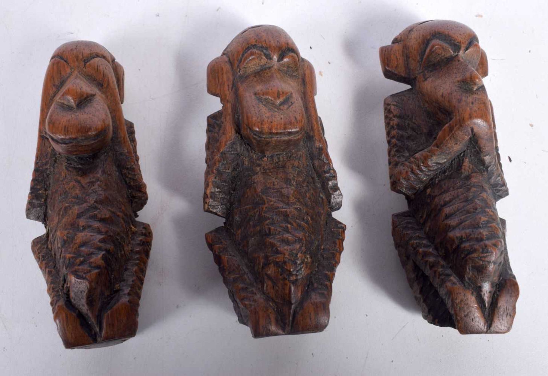 A collection of 3 carved African See no evil, hear no evil, speak no evil monkeys 12 cm (3)