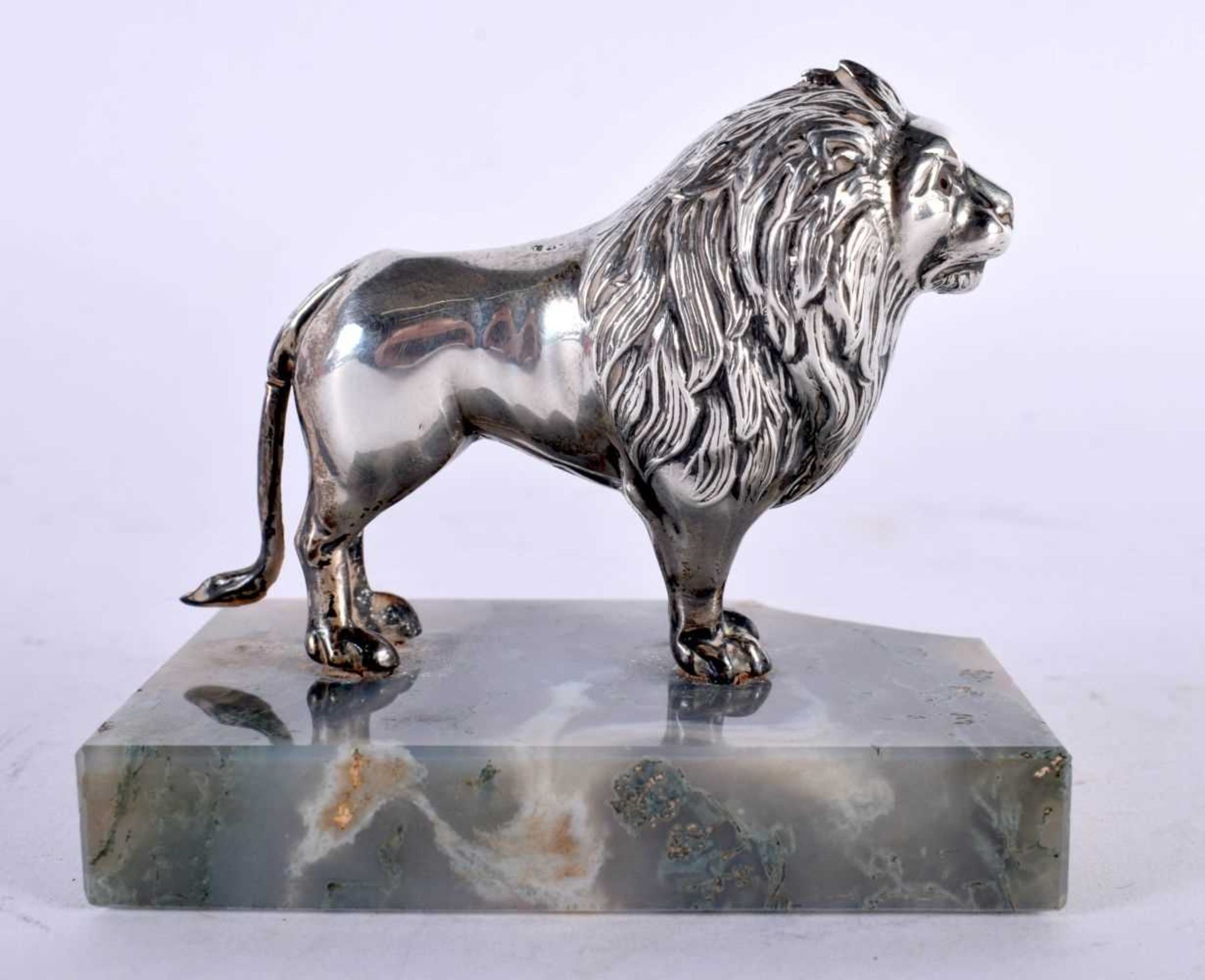 AN UNUSUAL EDWARDIAN SILVER MOSS AGATE AND RUBY FIGURE OF A LION by Henry Williamson. Birmingham