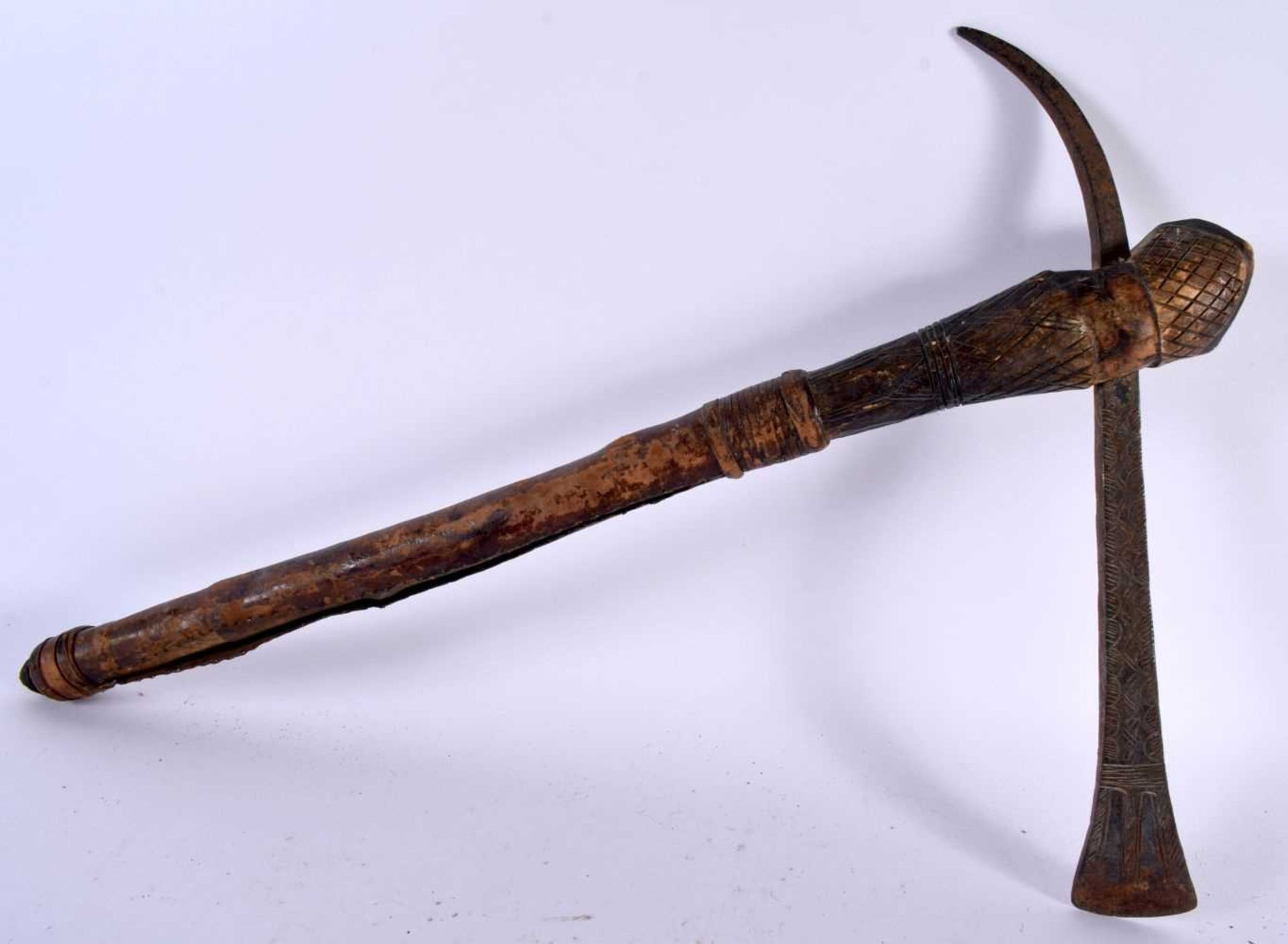 AN AFRICAN TRIBAL CARVED WOOD AND IRON AXE together with two others. Largest 52 cm long. (3) - Image 2 of 13