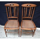 A pair of Mackintosh style Arts and Crafts mother of pearl inlaid chairs stamped underneath. 90cm (