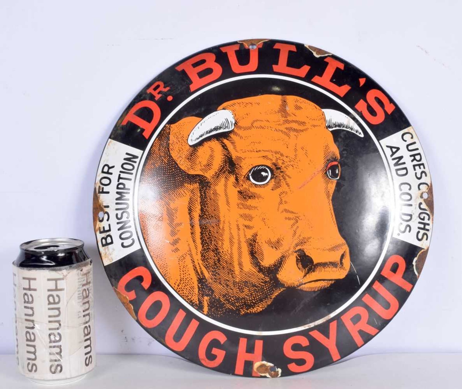 A metal enamel Dr Bull's cough syrup sign 30cm.