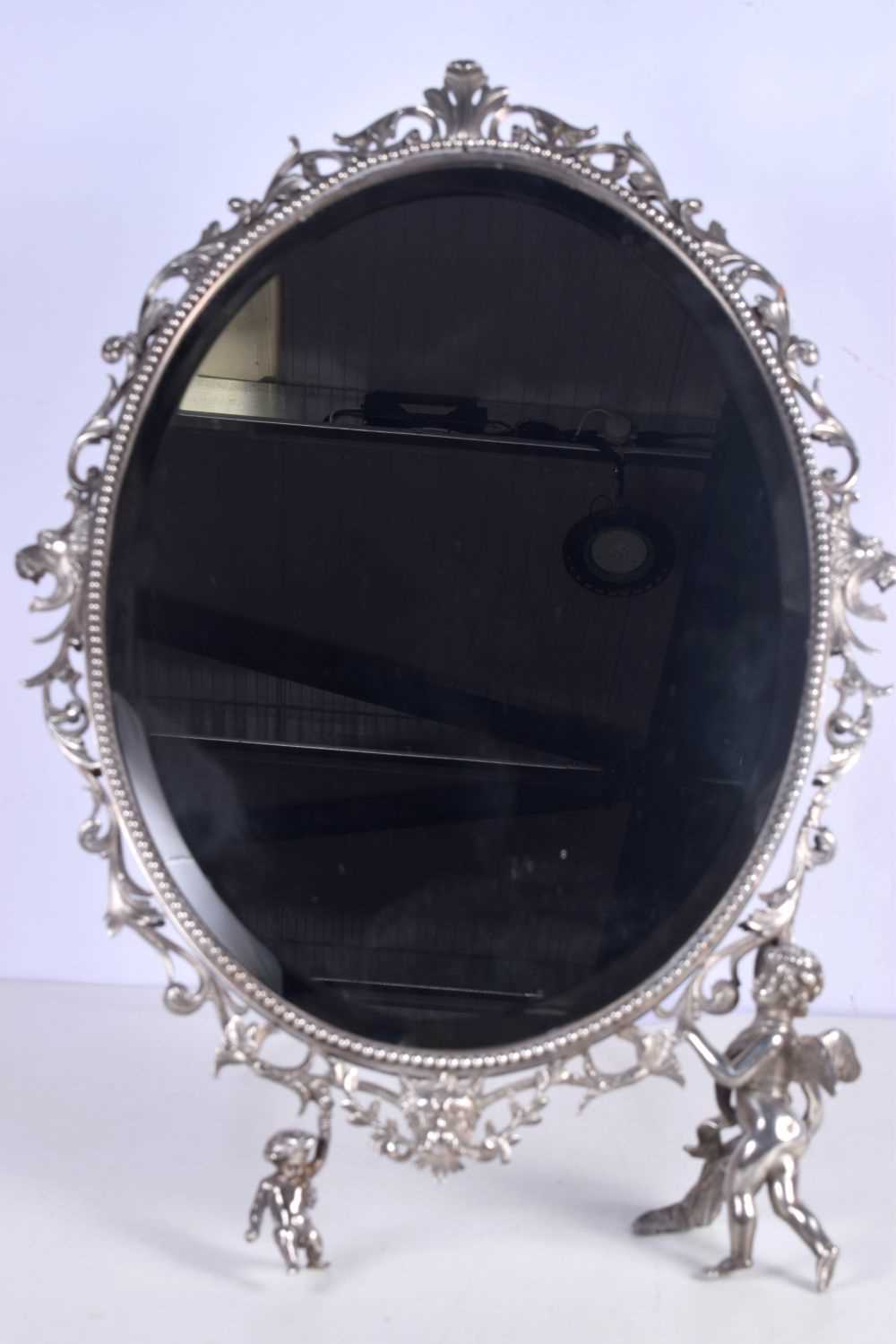 A large dressing table bevelled mirror plated metal with scrolling surround with Cherub supports - Image 2 of 5