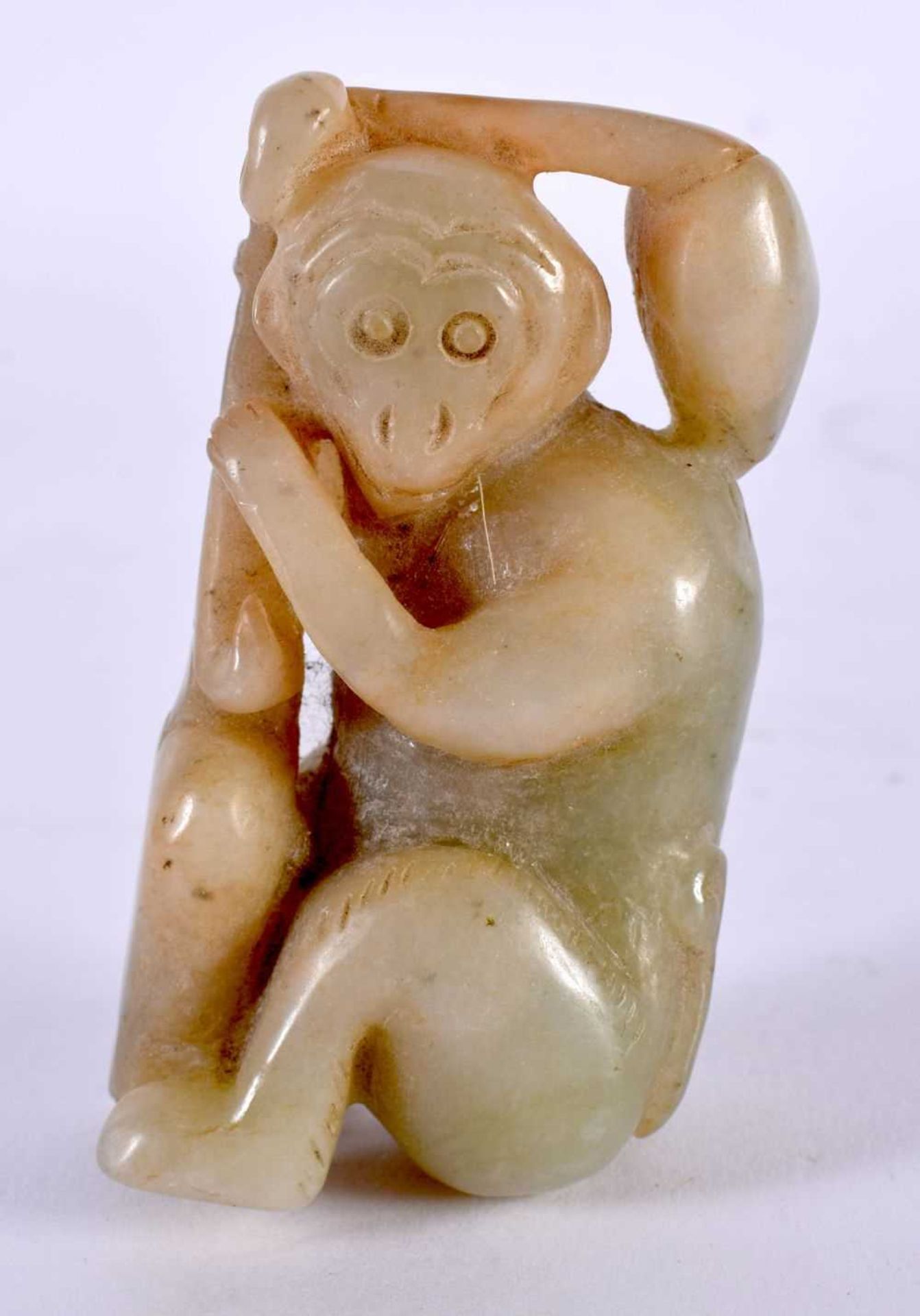 A CHINESE CARVED JADE MONKEY 20th Century. 7cm x 3.75 cm.