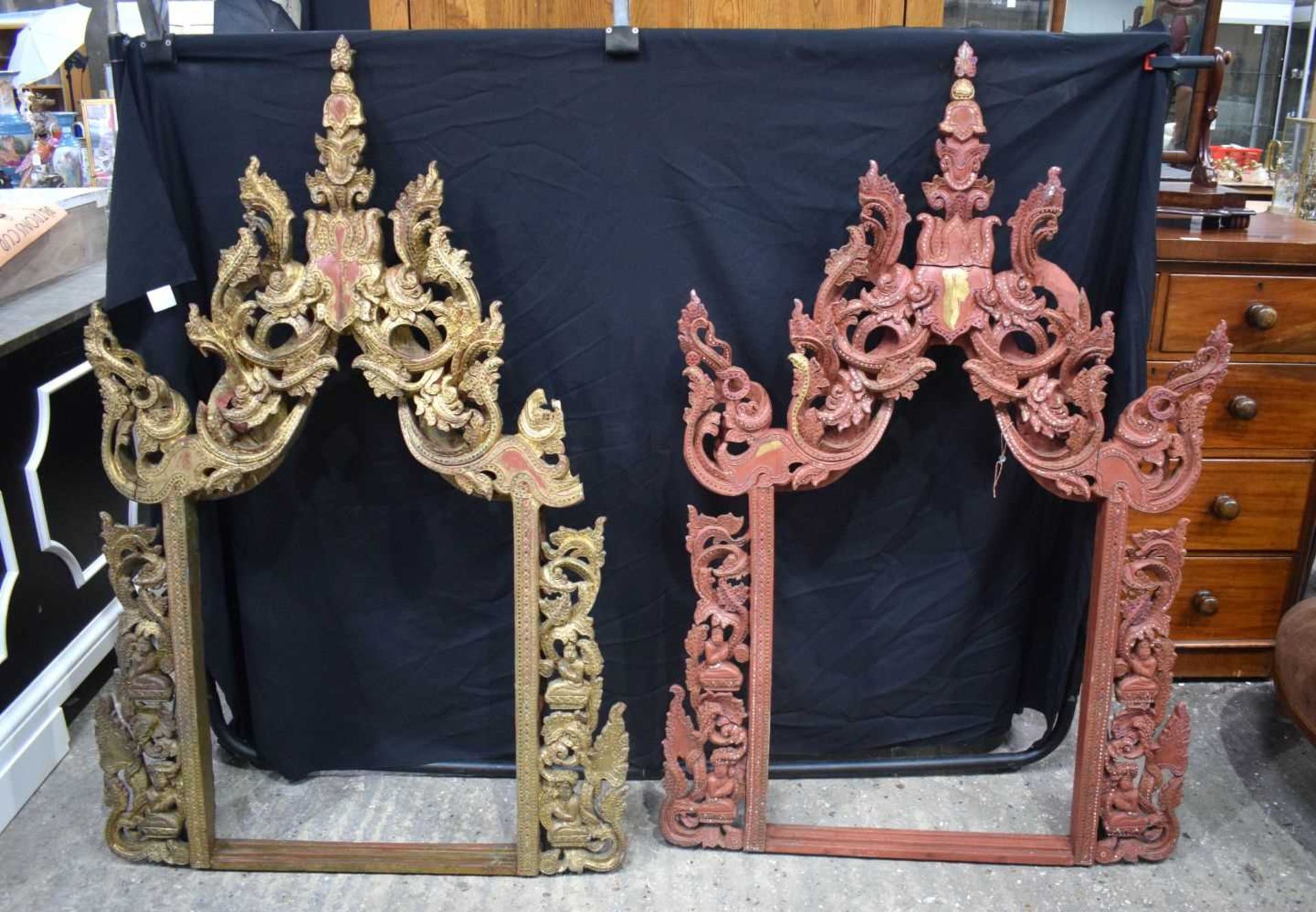 A pair of large South East Asian carved wood frames 152 x 128 cm (2)