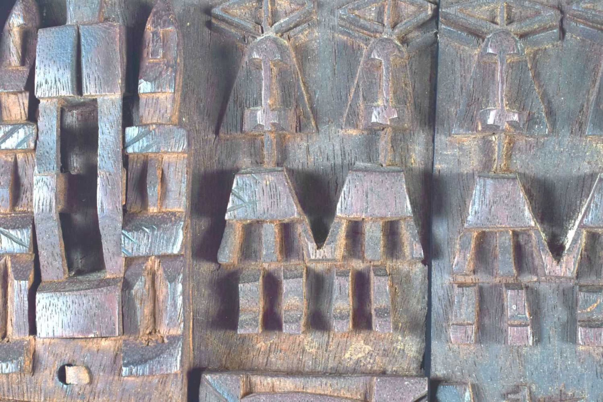 AN AFRICAN TRIBAL CARVED WOOD DOGON DOOR depicting figures and animals. 52 cm x 38 cm. - Image 2 of 6