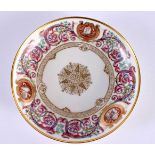 A LATE 19TH CENTURY FRENCH SEVRES PORCELAIN SAUCER painted with floral wreaths and motifs. 14.5 cm