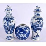 A PAIR OF 19TH CENTURY CHINESE BLUE AND WHITE PORCELAIN VASES AND COVERS Kangxi style, together with