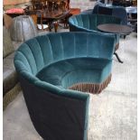 A pair of Semi Circular showroom fabric sofas together with a wooden round topped table 93 x 180 x