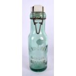 A FRENCH LIDEALE MARQUE GLASS CONSERVE BOTTLE. 24 cm high.