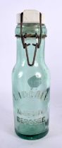 A FRENCH LIDEALE MARQUE GLASS CONSERVE BOTTLE. 24 cm high.