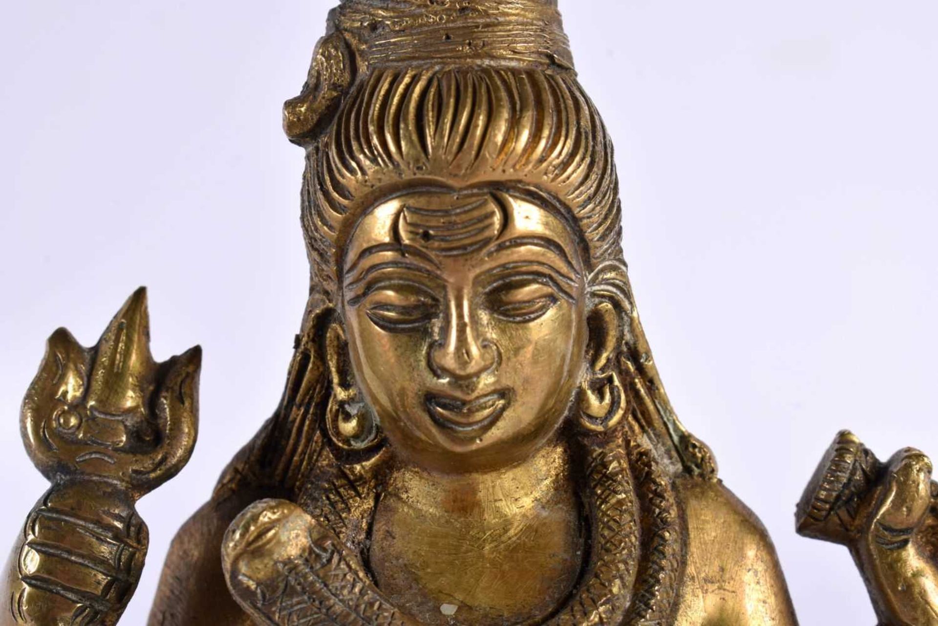 A 19TH CENTURY INDIAN BRONZE HINDU FIGURE OF SHIVA modelled seated on a lion skin with vasuki, - Image 2 of 8