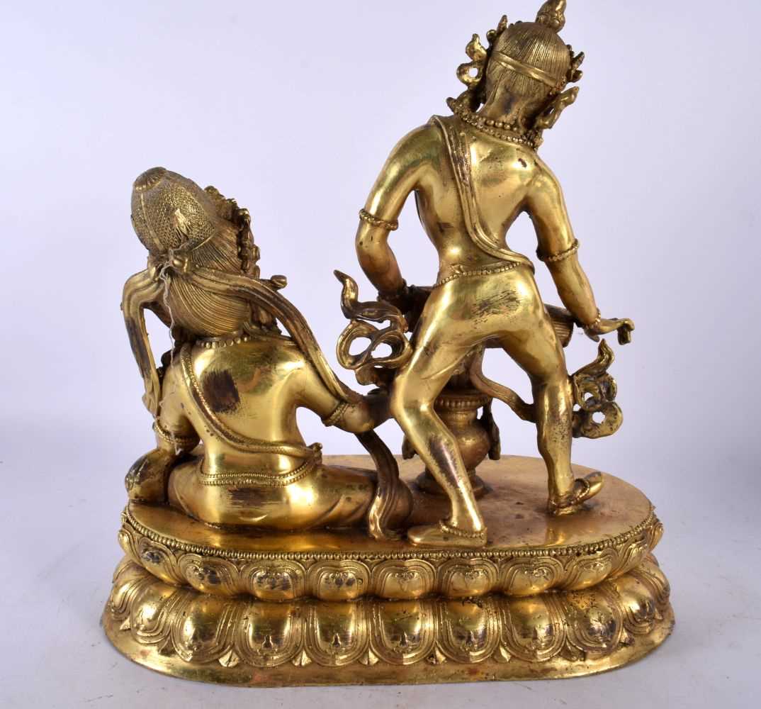 A LARGE CHINESE TIBETAN GILT BRONZE FIGURE OF TWO BUDDHAS 20th Century. 30cm x 20cm. - Image 6 of 8