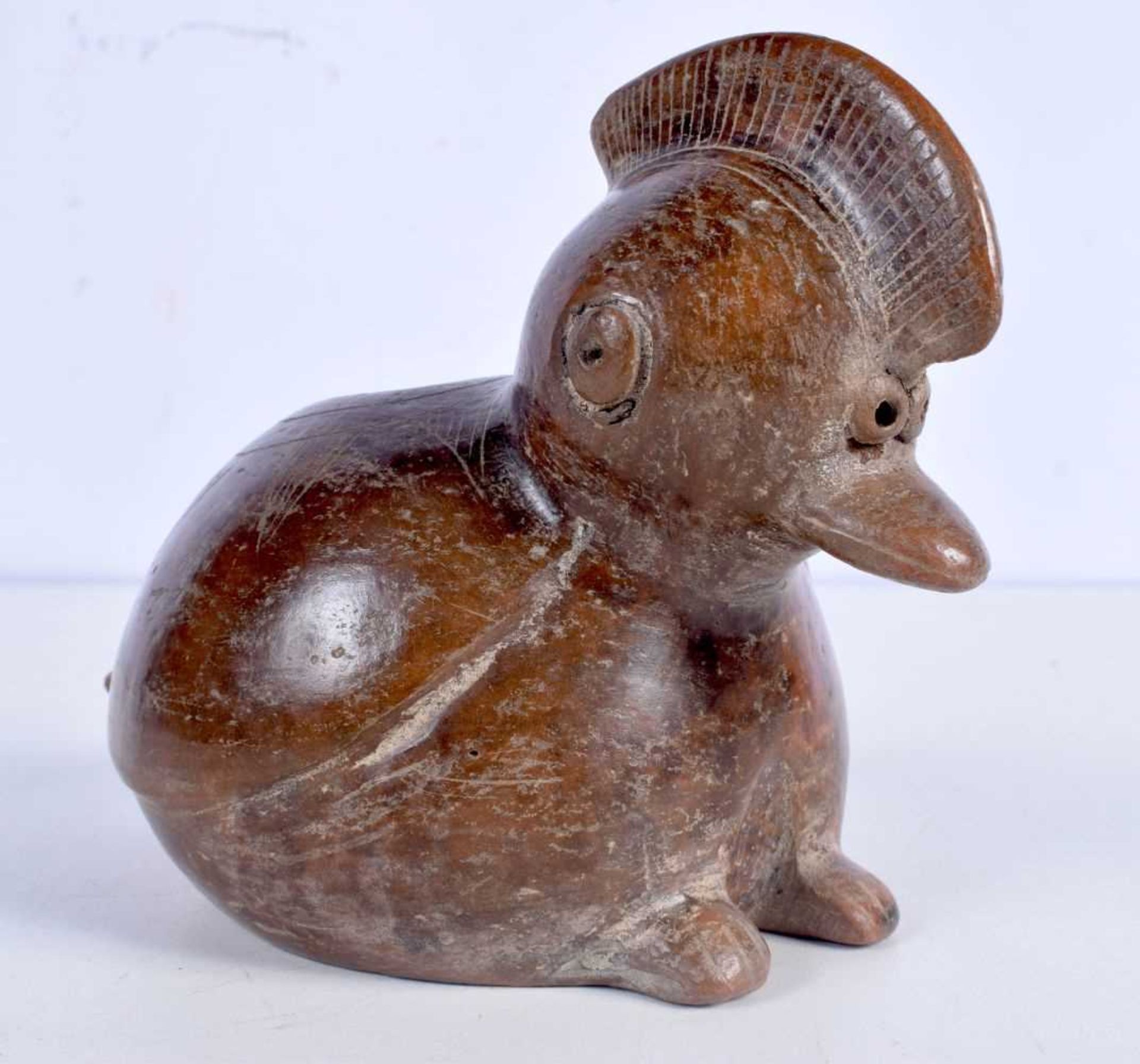 A South American glazed terracotta burner in the form of a Bird 14 cm