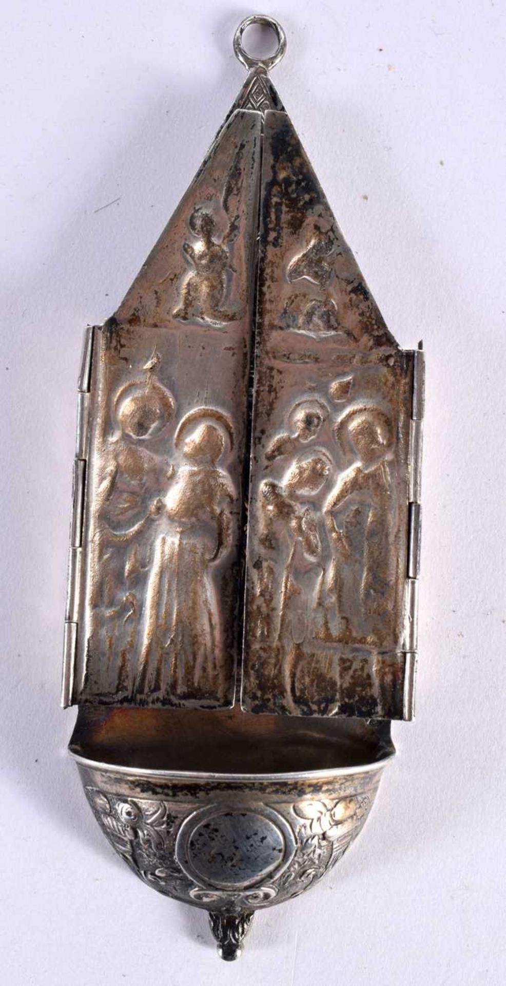 AN 18TH/19TH CENTURY CONTINENTAL SILVER TRAVELLING FOLDING FONT decorated with saints. 93.8 grams.