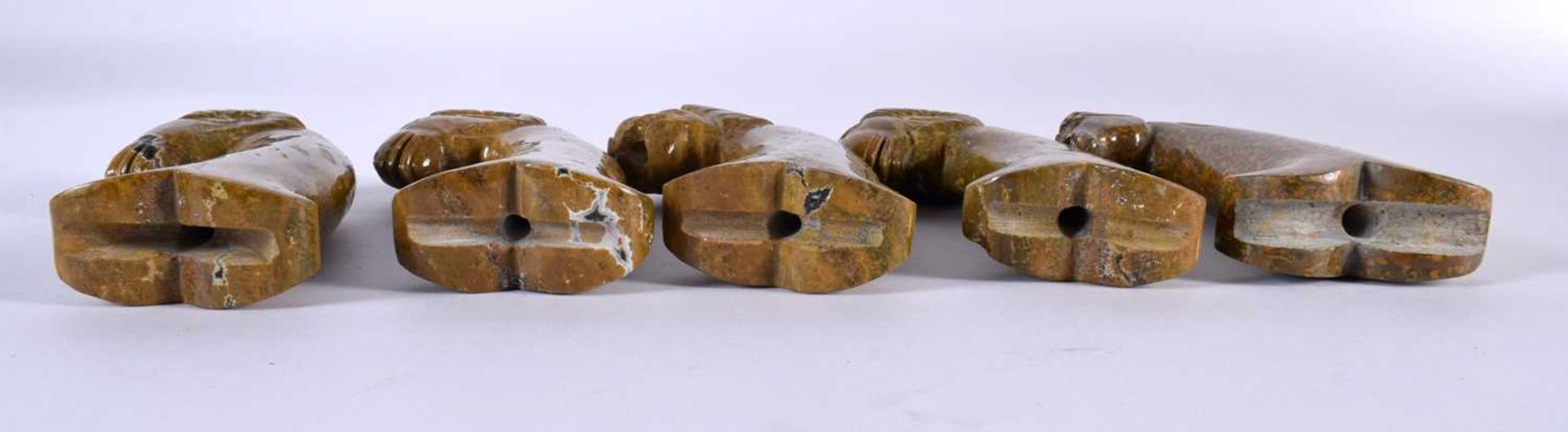 FIVE MIDDLE EASTERN CARVED PUDDING STONE AGATE HARDSTONE DAGGER HANDLES in various forms. 15cm long. - Image 6 of 6