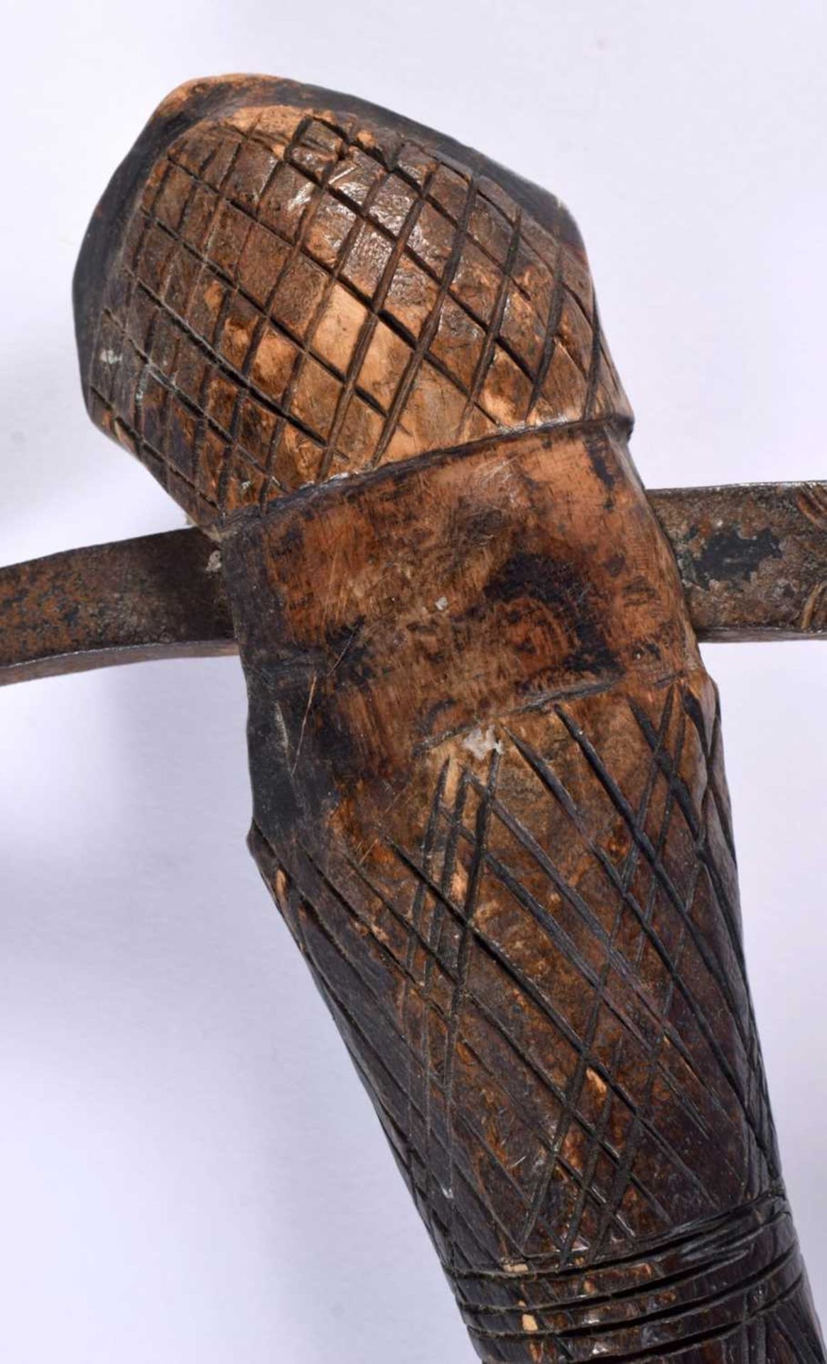 AN AFRICAN TRIBAL CARVED WOOD AND IRON AXE together with two others. Largest 52 cm long. (3) - Image 4 of 13