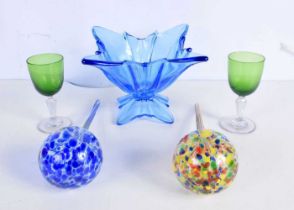 A heavy glass Cobalt blue bowl together with two glass plant watering bulbs and wine glasses. 16 x