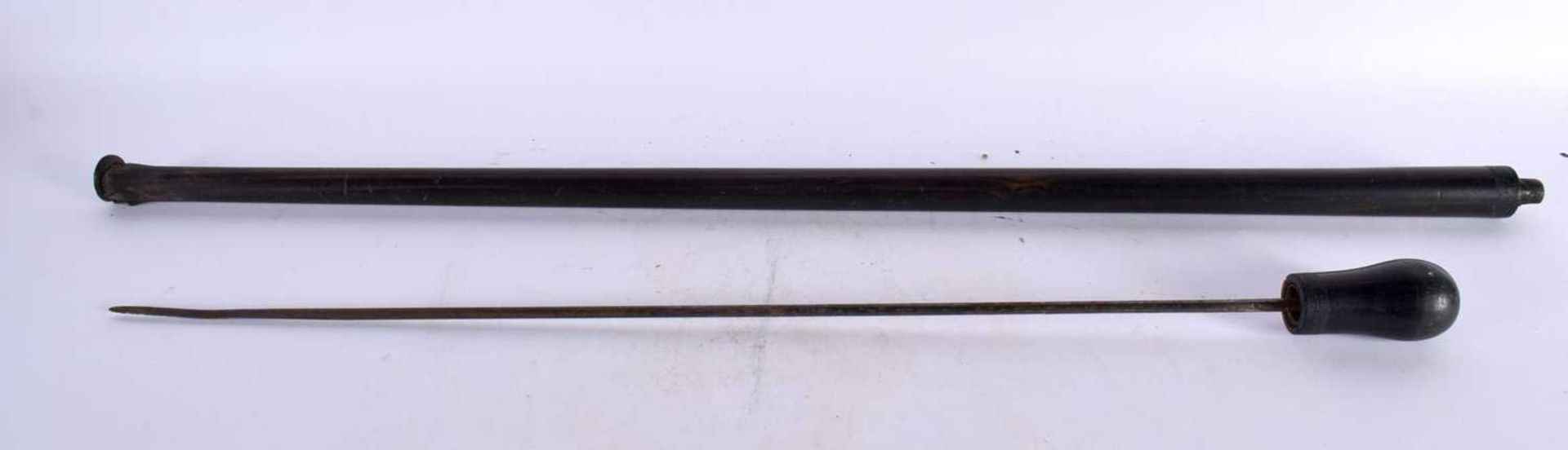 A VINTAGE SWORD STICK together with another flexible leather wrapped stick. Largest 85 cm long. (2) - Image 3 of 9